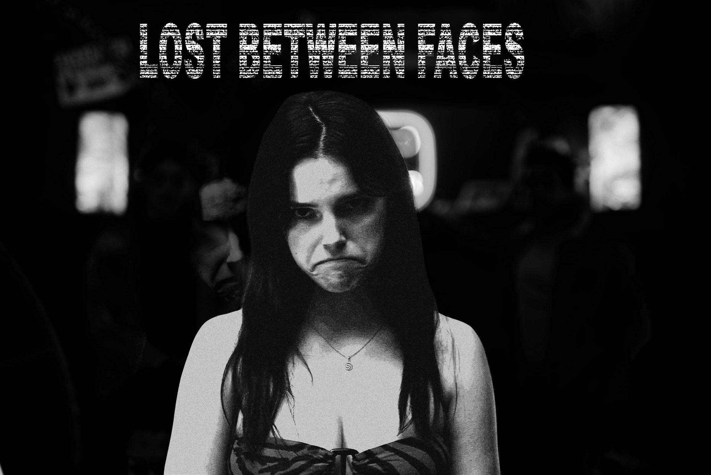 Nikki Freeman in a grainy black-and-white frowning close-up, titled 'LOST BETWEEN FACES.'