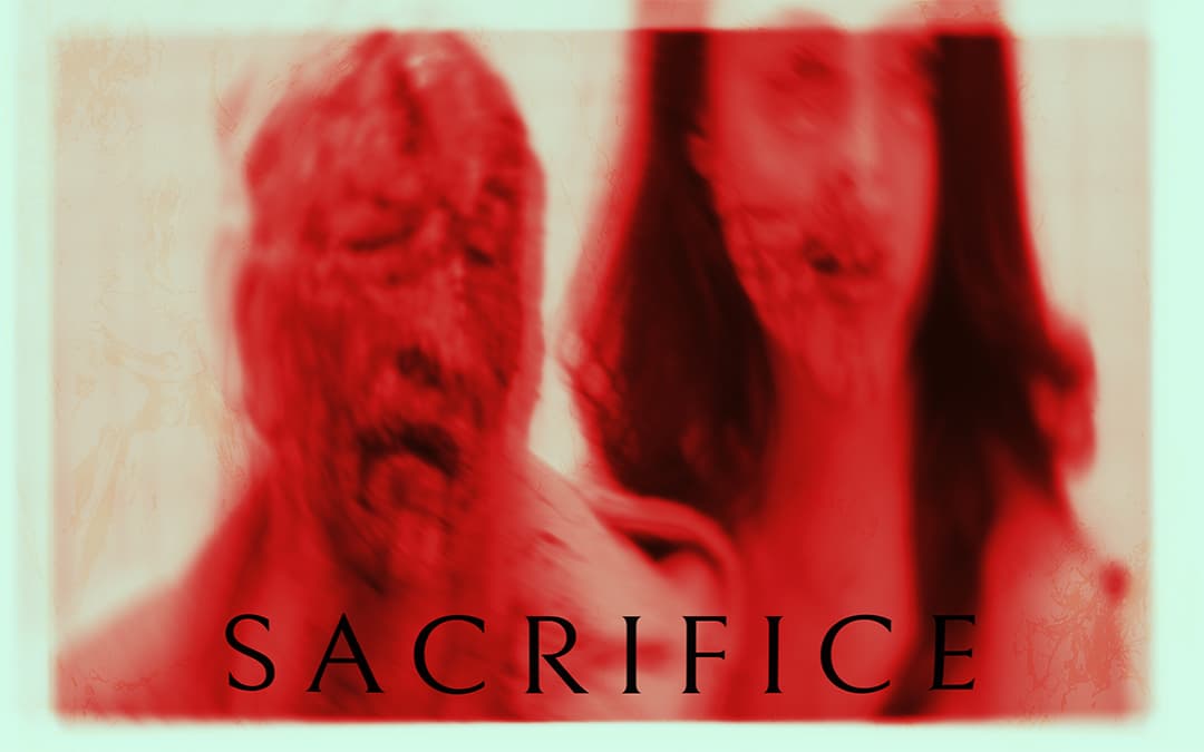A red duotone image of disfigured body-horror imagery, two heads side by side, titled 'SACRIFICE.'